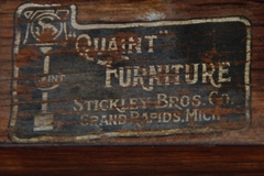Stickley Brothers decal makers mark: "Quaint Furniture Co., Stickley Bros. Co., Grand Rapids, Mich."